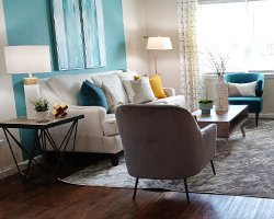 model living room with couches and coffee tables